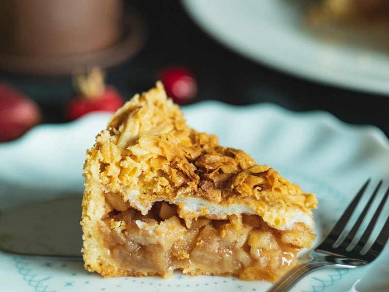 Sfeerbeeld (Unsplash): een stuk appeltaart